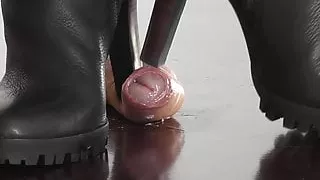 Cock and Ball Trampling under rough Boots