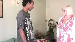 Busty British granny takes young black cock