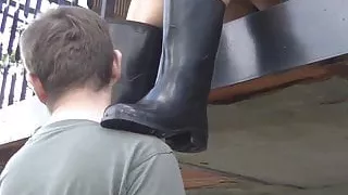 Rubber Boots on Shoulders