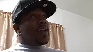 Busty slut deep throats black cock in the bedroom