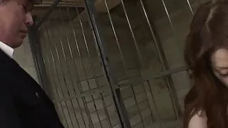 Saucy gives guard a blowjob through the bars