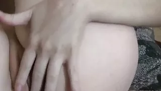 Petite redhead Raine fucks her pussy with her fingers