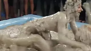 European hotties enjoy wrestling in mud