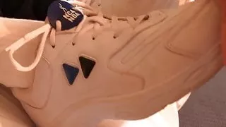 Fondling her cheerleading shoes and socked feet Preview