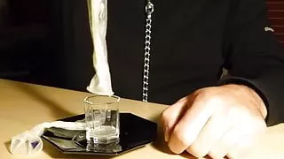 Drinking cum from two condoms.