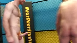 Beefy straight guy giving head to his wrestling opponent