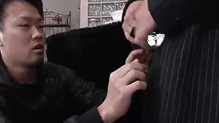 Asian babes sucking dicks in a pair