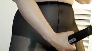 wife in tights pantyhose playing with toy