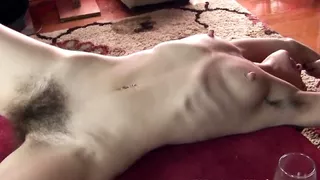 Sunshine strips naked to show off very hairy body