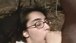 Nerdy brunette outdoor blowjob