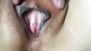 Playing with a Chinese whore's dark cunt lips!