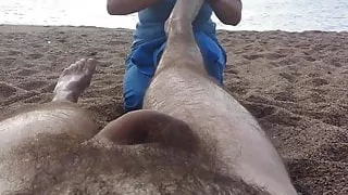 Nude massage on the beach