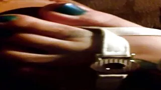 Wife in sandals shoeplay