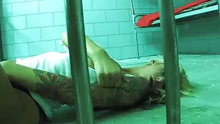 Prisoner Brooke plays with her tight pussy