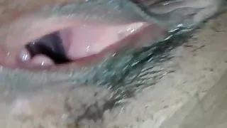 Gaping her pussy