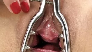 Sexy slut plays with an lovely speculum