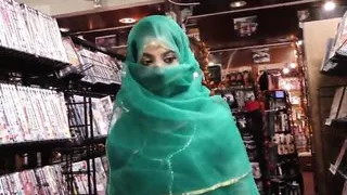Exotic Arab babe Nadia Ali fucked by black in porn shop