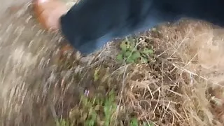 Walk outside with high heel sandals.