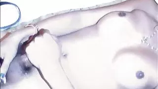 Ladyboy strips down and jerks off while giving blowjob