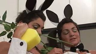 Steamy lesbian threesome taking place in a garage