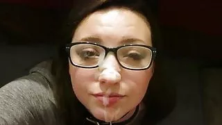 Geek girl in glasses taking facial