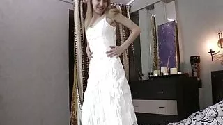 Amanda S enters bedroom and strips naked on bed