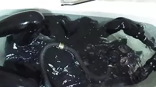 Rubber girl in the bath