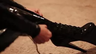 Latex girl (black latex catsuit & thigh high pvc boots)