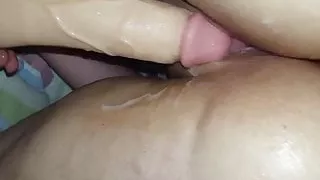 Were streching her pretty holes together