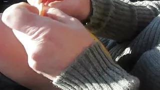 putting a rubber on a banana