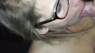 Wearing glasses while sucking me till I cum in her
