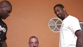 Black thugs sharing a middle aged white guy with moustache