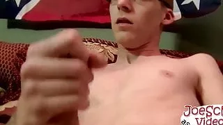 Nerdy looking dude with glasses strips down and jerks it off