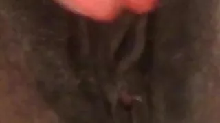 Playing with my hairy pierced pussy.