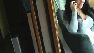 On the phone with her husband