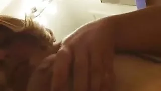 Young girl playing with tits