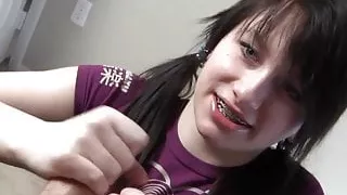 Pigtailed cutie handjob