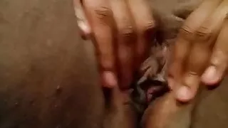 Playing in her pussy