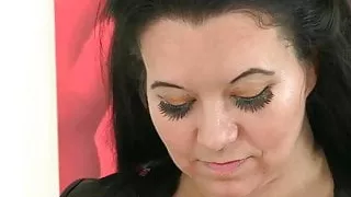 Curvy milf Louise Bassett is fingering her mature pussy