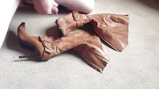 Cumming on tan knee boots