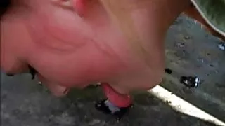 young girl licking her spitting