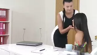 Two gorgeous lesbian babes playing with a big black dildo