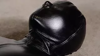 Leather bondage and orgasm