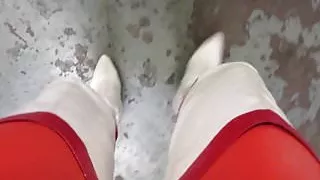 White thigh boots and the tightest red leggings i have