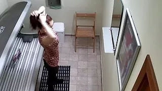 Shaved and Tight Pussy Caught in Solarium