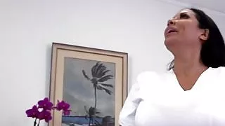 Busty babe wanking big dick in closeup