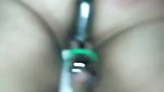 Rubber her clit with the wand while the dildo is fucking her