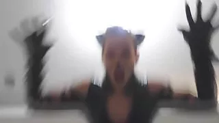 Catwoman torture the bad man