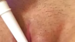 Masturbating with a toothbrush