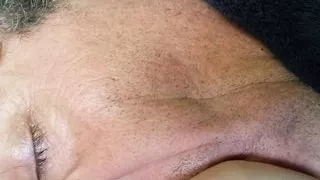 Baby girl breast feeds a daddy